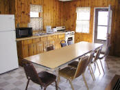 The whole gang can sit down to dinner at the same time in Cabin #11.
