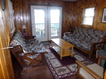 A spectacular view of Beautiful Portage Lake awaits you in Cabin #11.