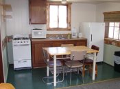 The kitchen in Cabin #13 has modern appliances.