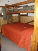 The second bedroom in Cabin #4 has a double bed.