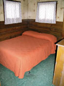 The second bedroom in Cabin #4 has a double bed.